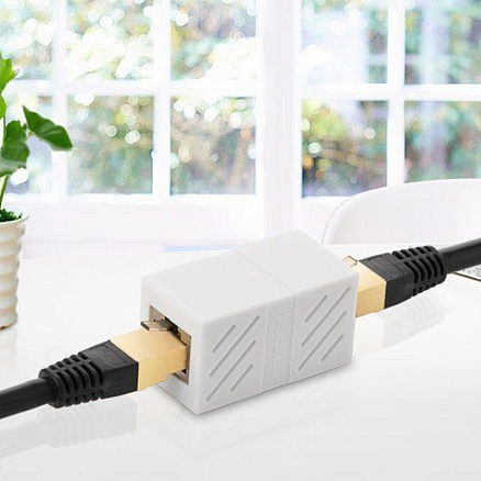 Переходник RJ45 - RJ45 (мама - мама) Ugreen NW114 белый